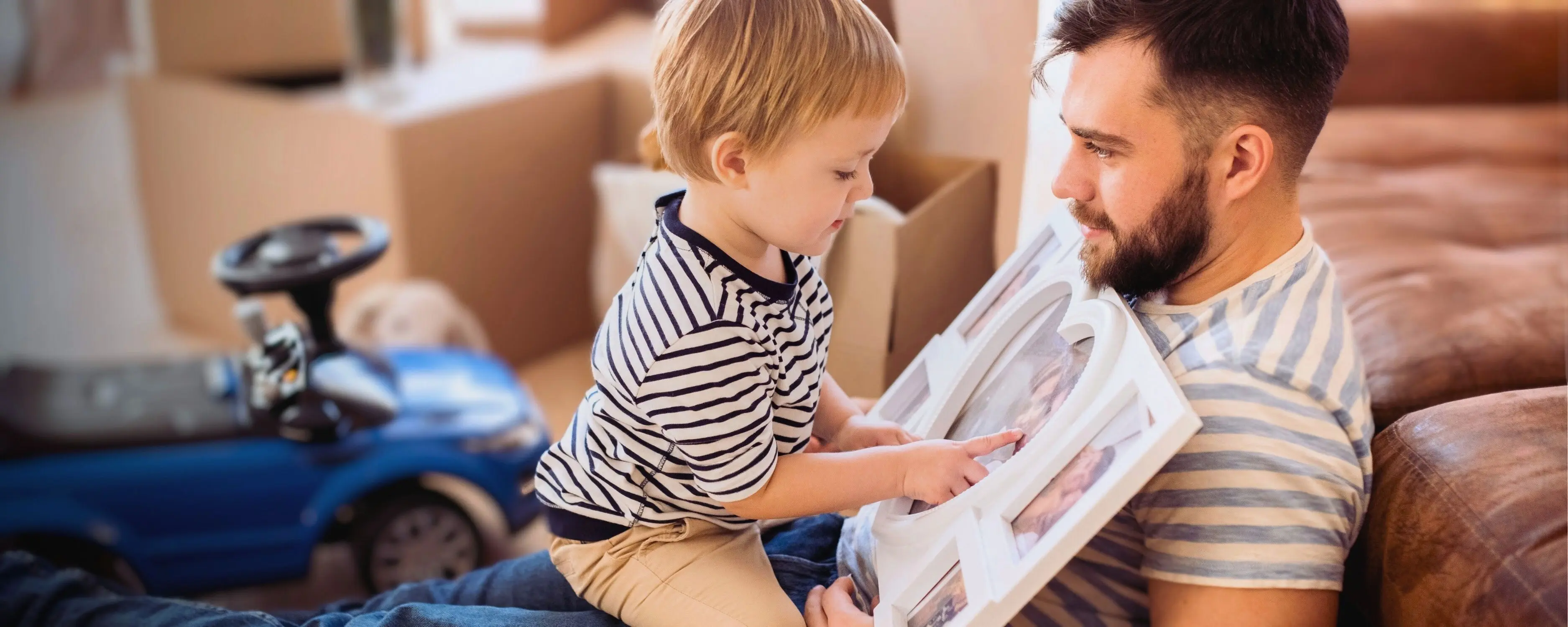 Mother and child browsing a photo album